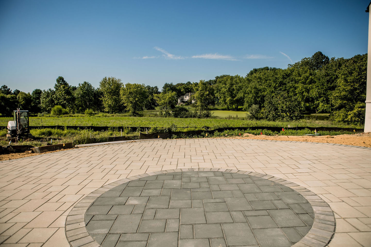 an image showing patio and hardscape design services by L&C grounds company