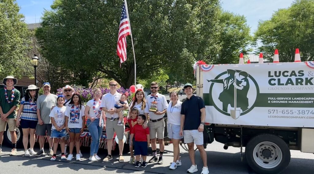 Clark and LC Grounds Team after winning the award for best business float